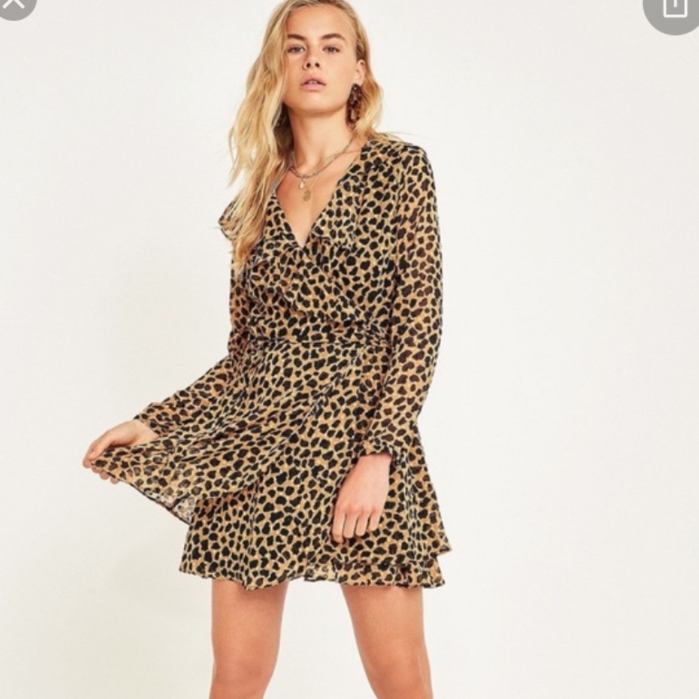 FREE PEOPLE. Leopard wrap frenchie dress